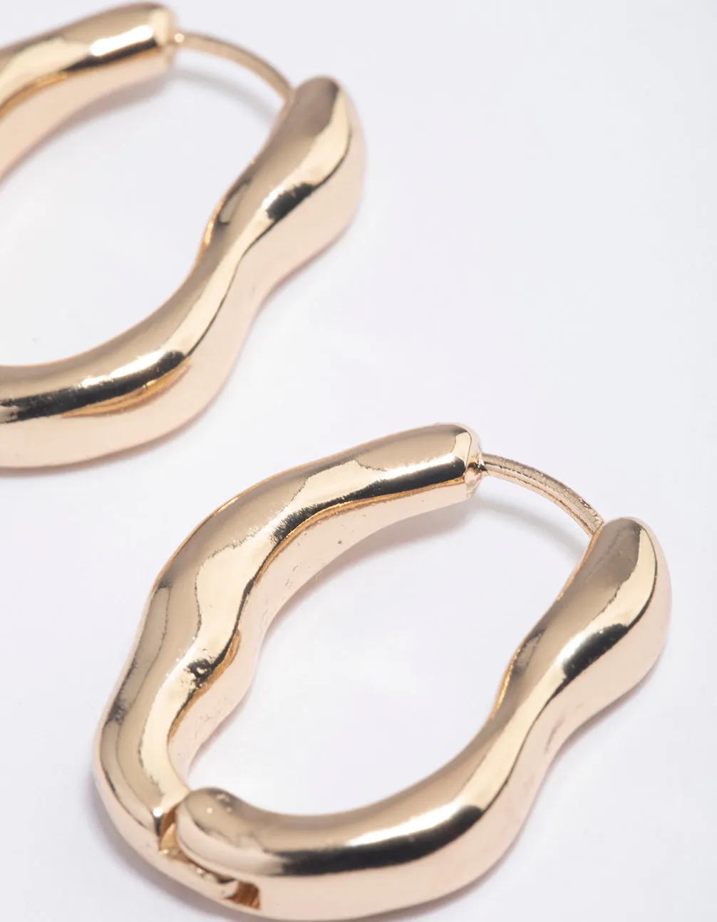 Gold Molten Oval Huggie Earrings