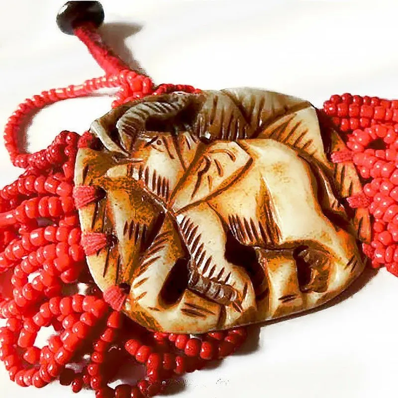 Hand Carved Elephant Pendant and Red Mini Bead Bracelet